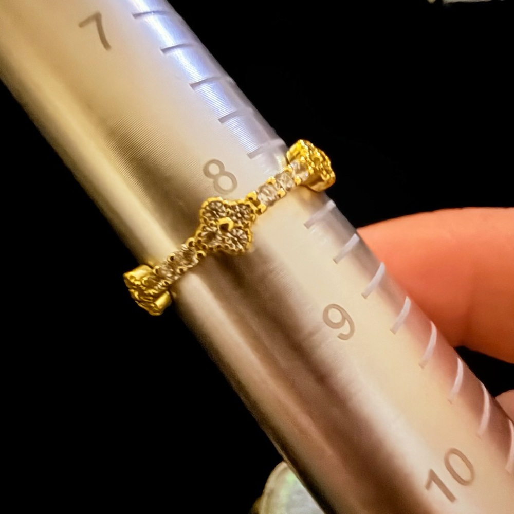 Dainty Clover eternity stacking ring. 14KGP 925 by Freida Rothman.